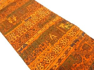 縮緬地　花唐草に古代人物模様　名古屋帯